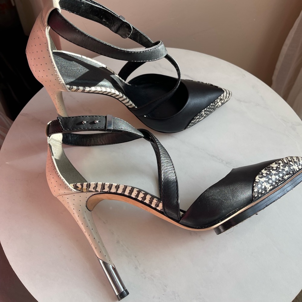 Black snakeskin cut out heels